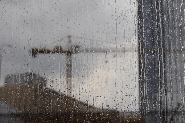 rainsoaked-window-droplets-creating-blurred-600nw-2681828311
